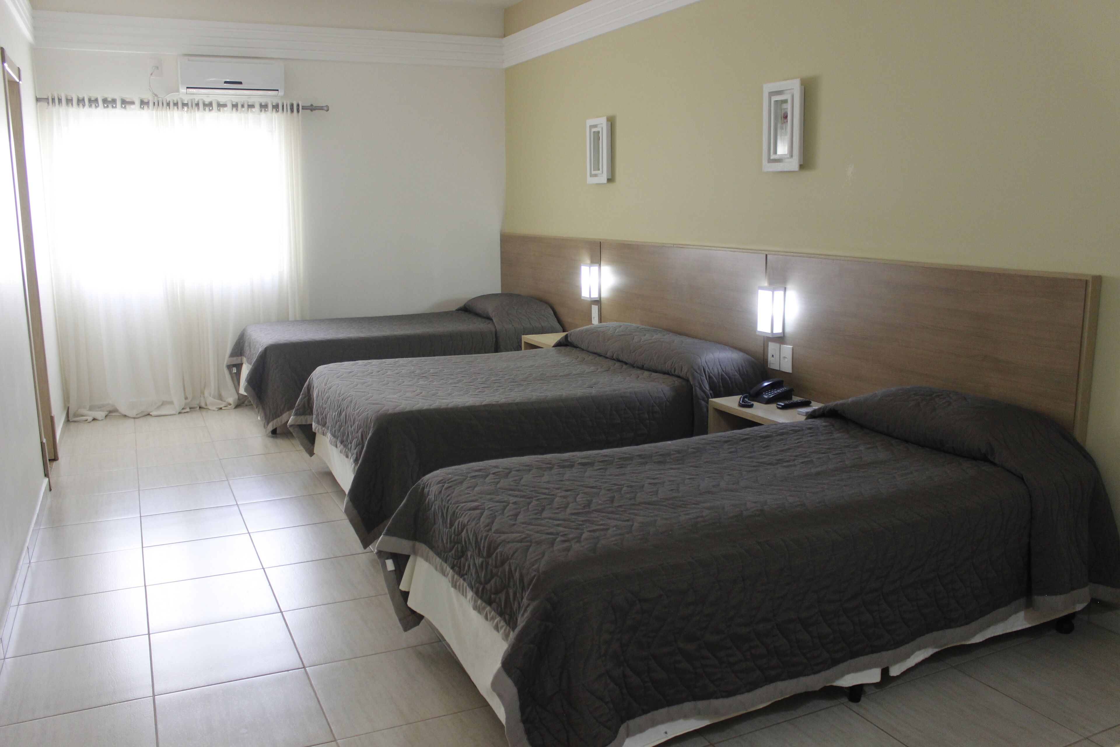 deluxe triple room | 1 bedroom, minibar, desk, laptop workspace