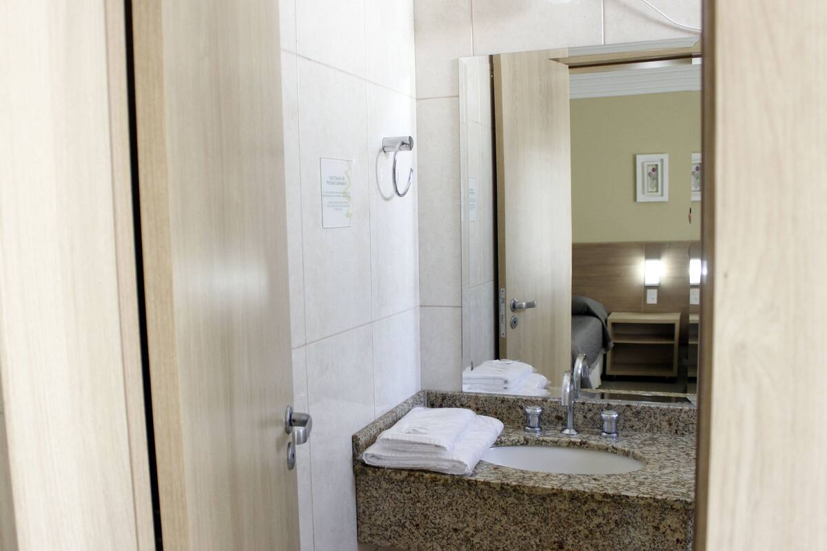 hair dryer, bidet, towels, soap