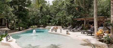 Outdoor pool, open 8:30 AM to 10:00 PM, pool loungers