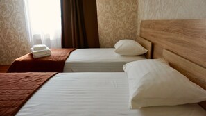 Comfort kamer, 1 twee- of 2 eenpersoonsbedden, 1 tweepersoonsbed of 2 eenpersoonsbedden, niet-roken | Geluiddichte muren, gratis wifi, beddengoed