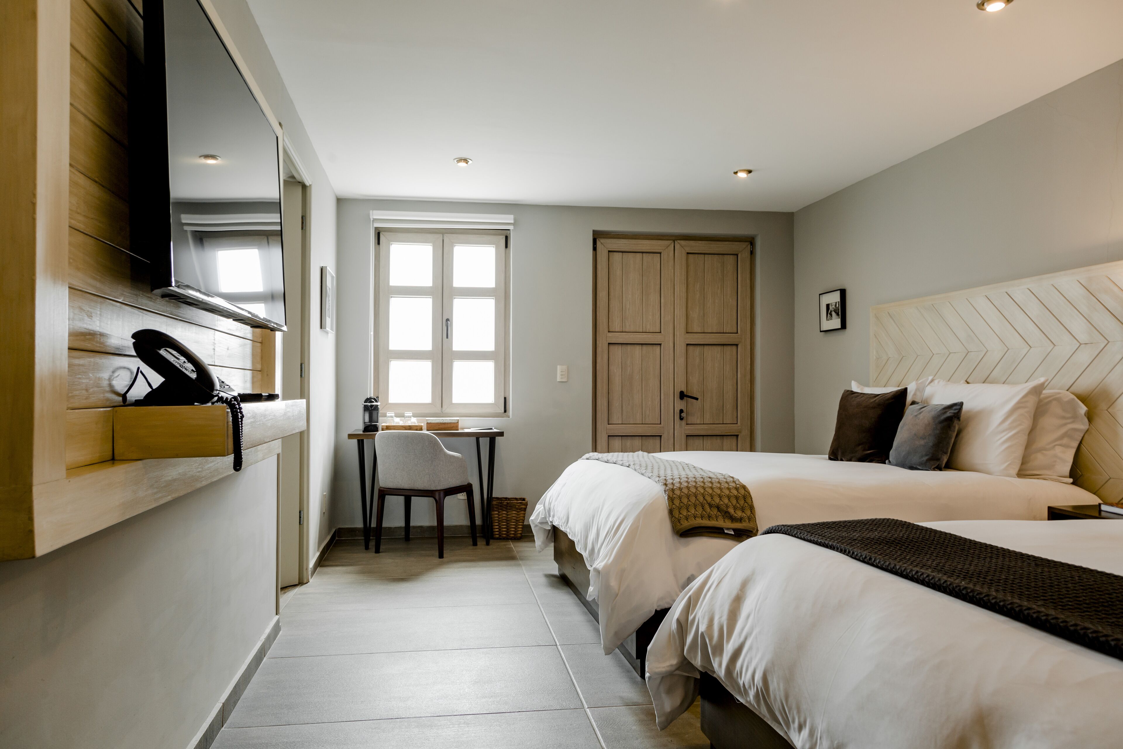 Deluxe Double Room, 2 Queen Beds, Non Smoking, Courtyard View | Premium bedding, down comforters, in-room safe, individually decorated