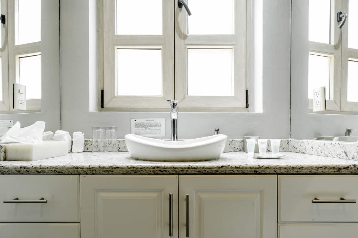 luxury room, 1 king bed | bathroom | free toiletries, hair dryer, bathrobes, towels