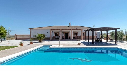Villa Paquita Holiday Home in Seville countryside.