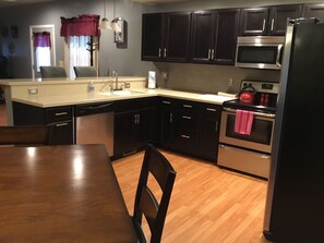 Fridge, microwave, oven, stovetop - Classic, updated house with porch & backyard  (Newark)