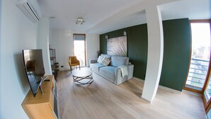 Apartemen Eksekutif, Boleh Merokok, pemandangan kota | Ruang keluarga | Smart TV dan Netflix