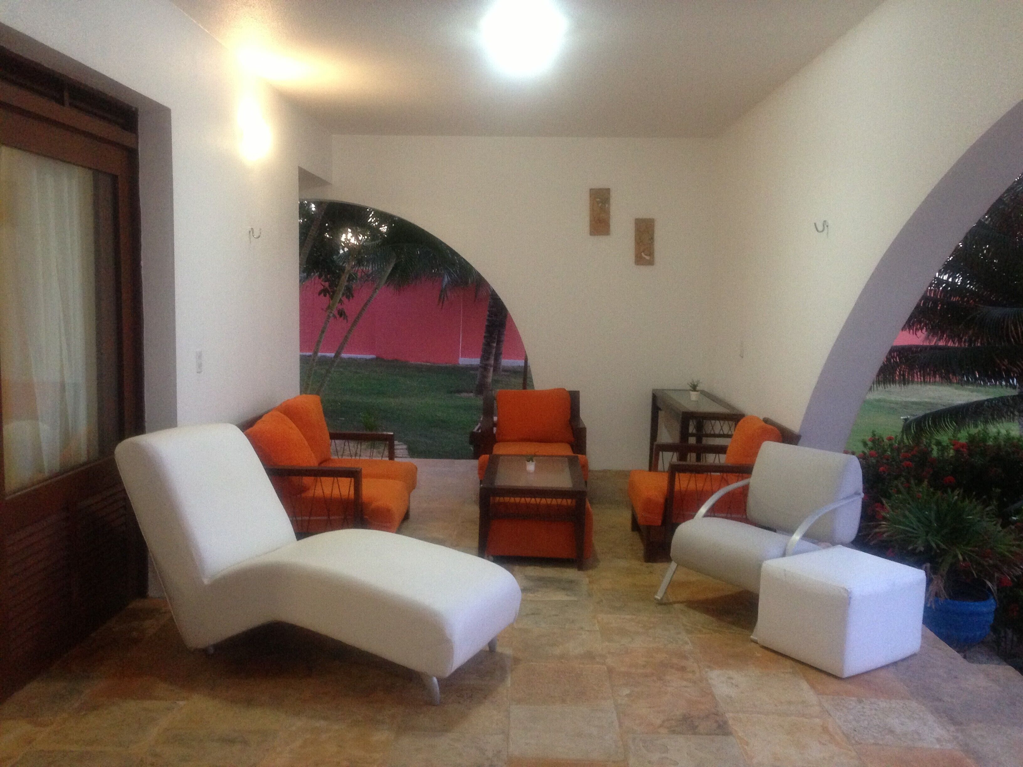 Beach house with swimming pool, terrace and walk in the sand.