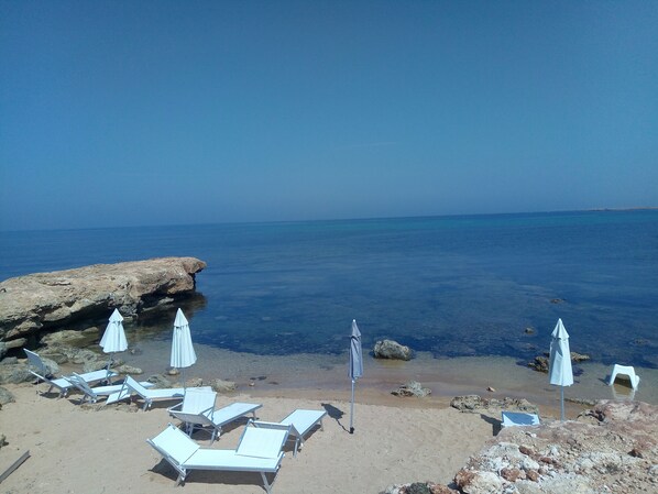 Beach nearby, sun-loungers