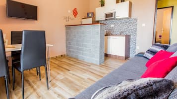 Comfort Apartment, Sea View | Private kitchen | Fridge, stovetop, electric kettle, cookware/dishes/utensils