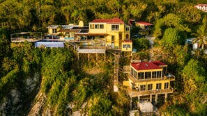 Exterior - Private cliffside retreat full of magic. 9 bedrooms, 21 beds - infinity pool. (St. Thomas)
