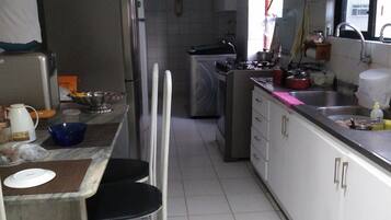 Fridge, blender, cookware/dishes/utensils