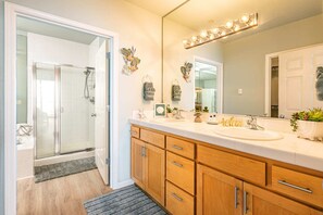 Bathtub, hair dryer, towels