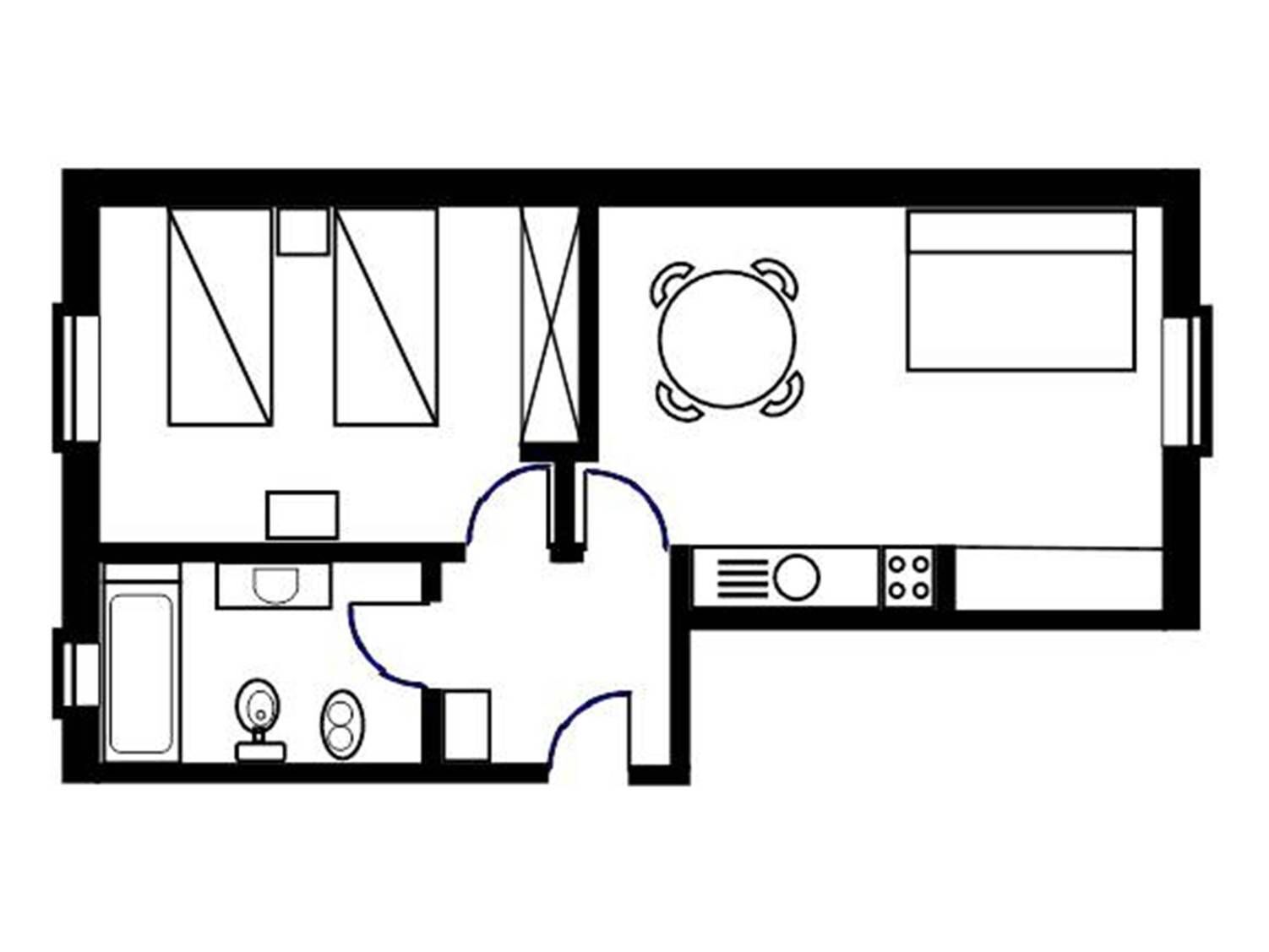 A floor plan with a kitchen, dining area, and a small seating area.