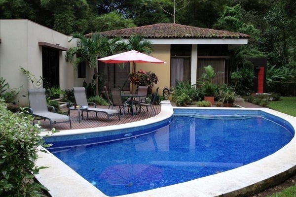 Private deck and pool with awesome view of rainforest covered mountain.