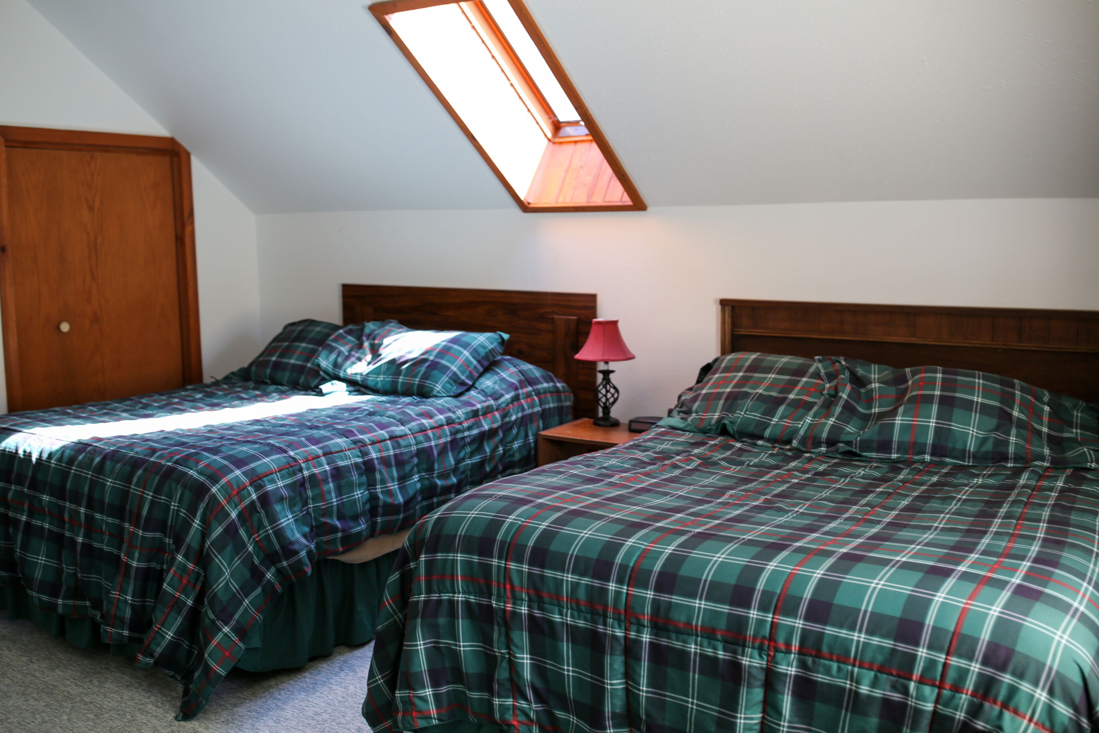 Lakeside cabin with Hot Tub and full kitchen!  Sleeps up to 12 people.