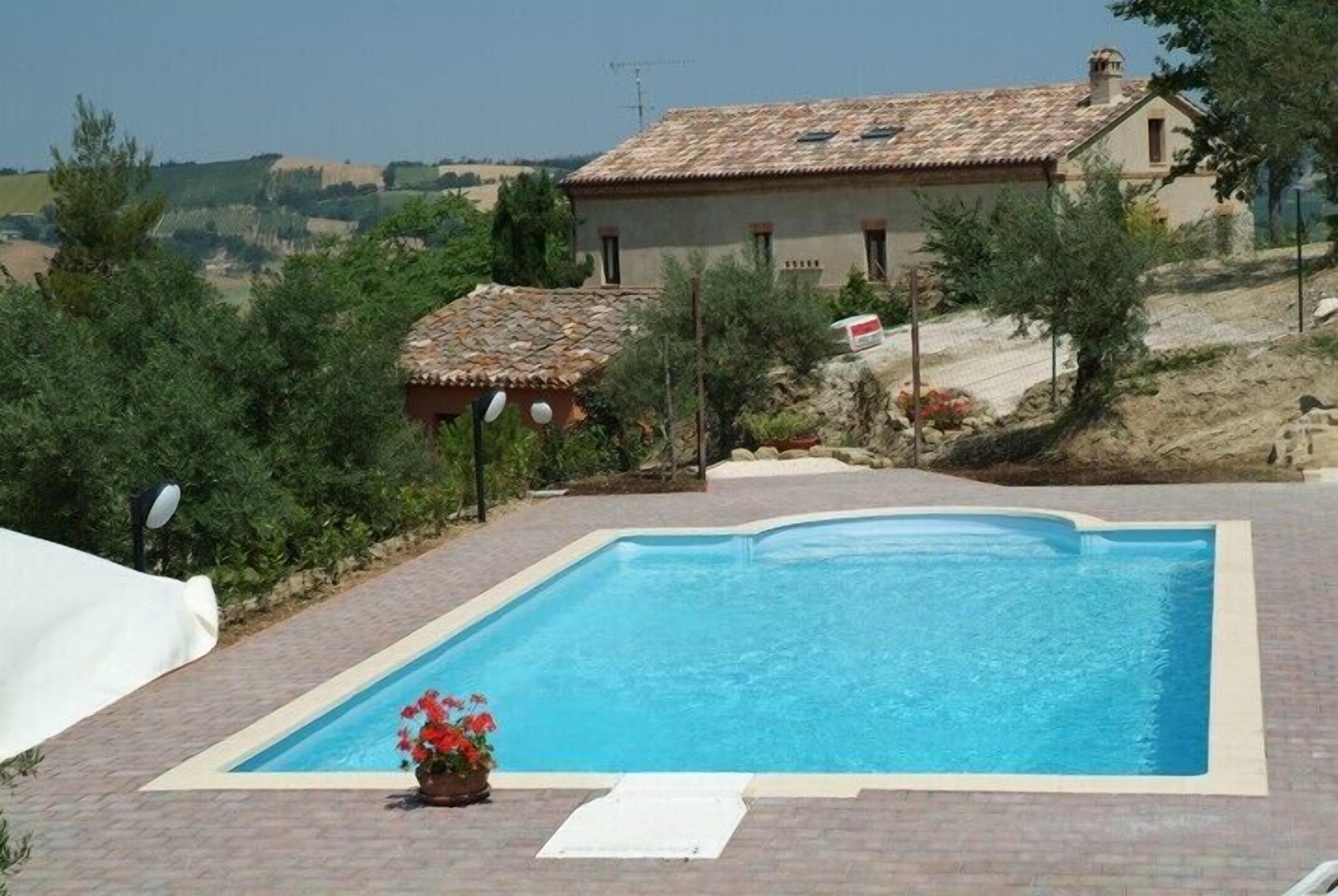 The pool with Il Castellano in the background.