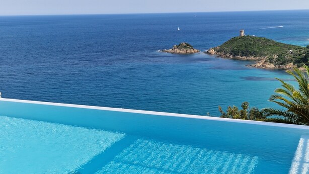 A pool with a view of the sea and a lighthouse on a small island. - Luxury villa 5 * panoramic sea view private heated pool + SPA (Conca)