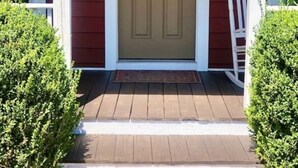 A front door with a wreath, a mailbox, and a white chair outside. - Peaceful Quiet Getaway in Amish Country!10 min. to Berlin & Walnutcreek. #hotub (Dundee)