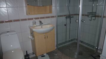 Shower, jetted tub, soap, toilet paper