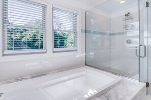 Bathtub, jetted bath, hair dryer, towels