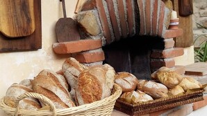 A traditional brick oven with a wooden sign above it. - Beautiful farm house with pool, open spaces  and amazing sea views  (Bordighera)