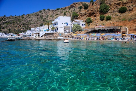 On the beach. John Akroyiali rooms