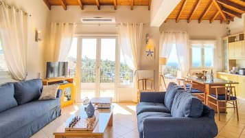 Smart TV, lareira, DVD player, livros