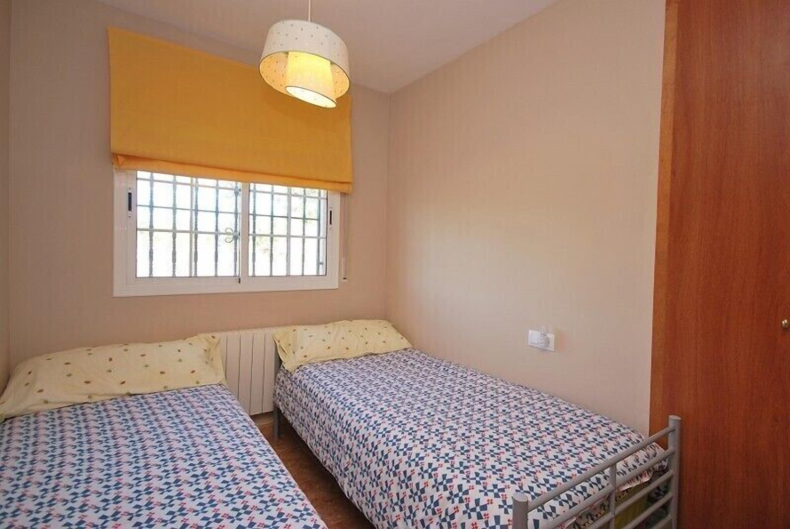 House with private pool, artificial grass, terraces and flat gardens.