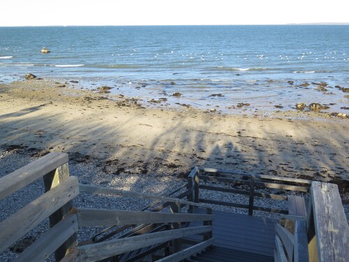 Large heated pool, games room, private bay beach access, gardens, kid-friendly