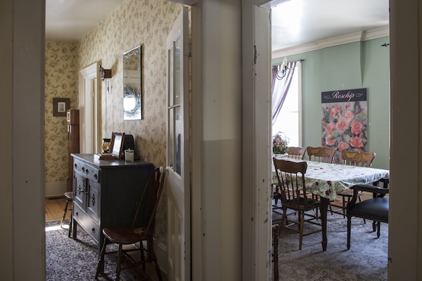A shot of the hallway and dining room