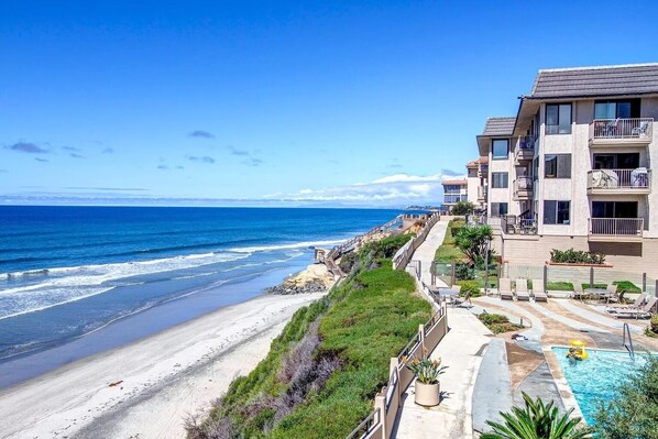 On the beach, sun loungers, beach towels