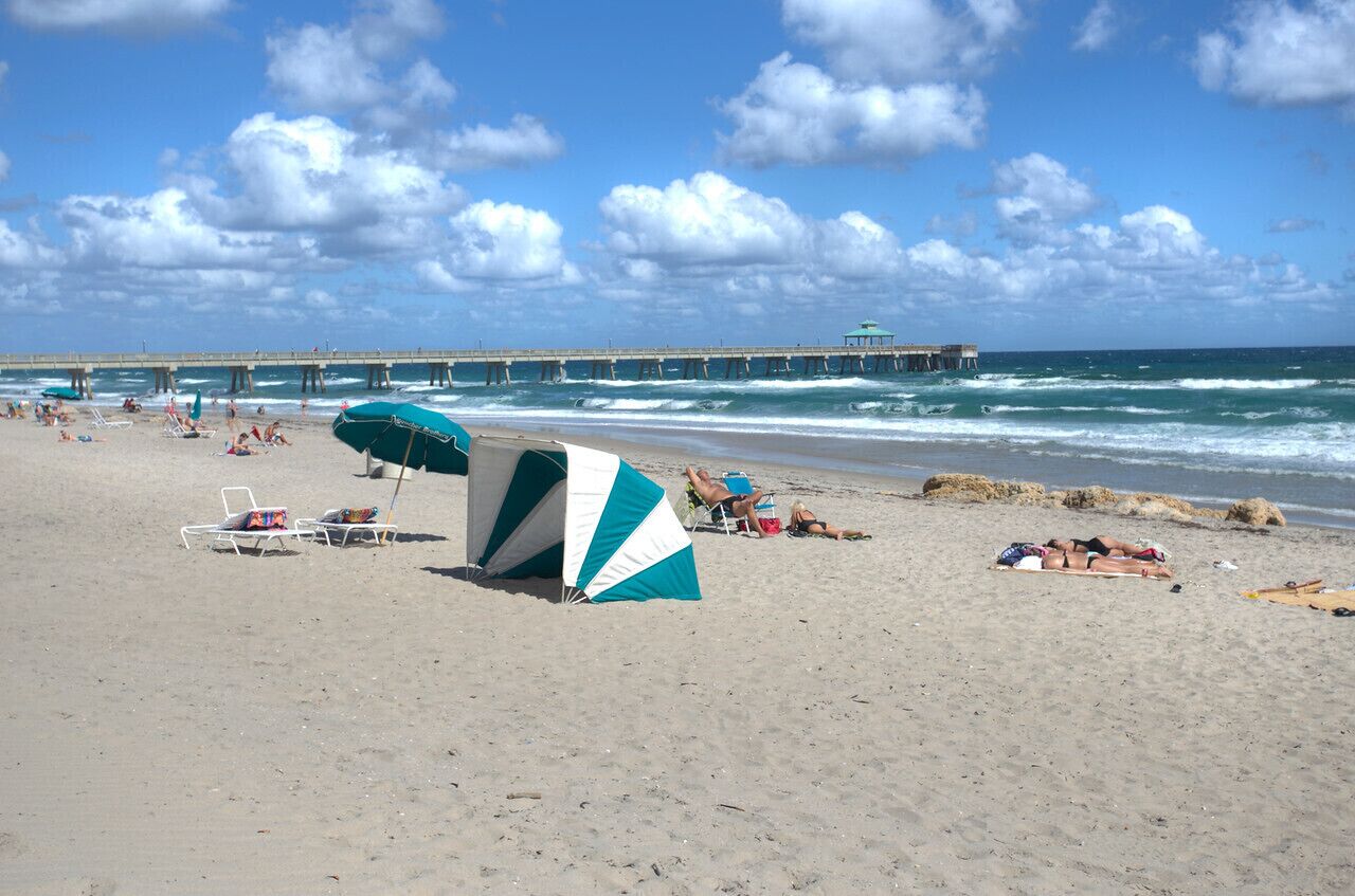 On the beach, sun-loungers, beach towels