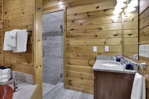 Shower, jetted bath, hair dryer, towels