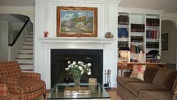 Smart TV, fireplace, DVD player, books