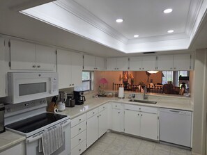 Fridge, microwave, dishwasher, coffee/tea maker