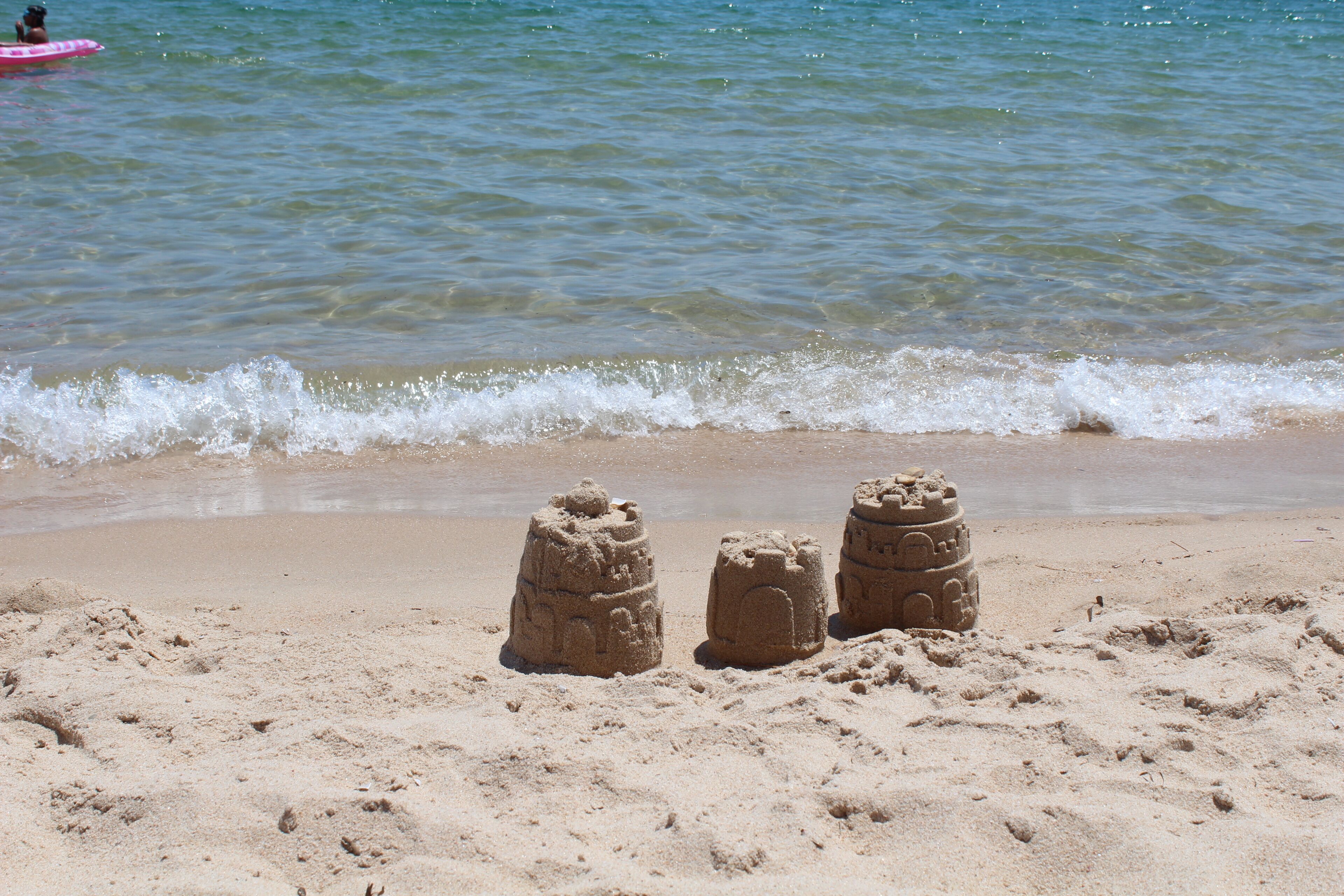 On the beach, sun loungers, beach towels