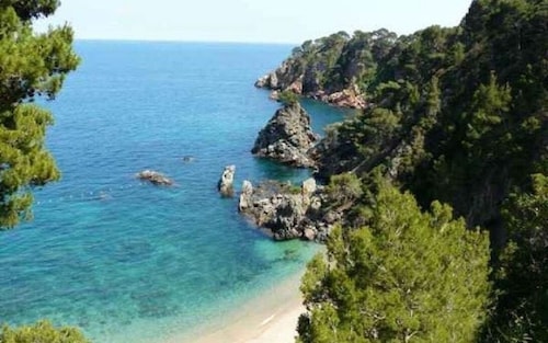 Grand appartement, vue sur la mer et la montagne, piscine privée, proche des commodités et IronMen 