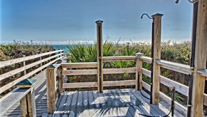 A wooden deck with railings overlooking a coastal area. - Southside of 30A, Gated beachfront pool sleeps 7 , 2 min walk to Rosemary, NEW ! (seacrest beach)