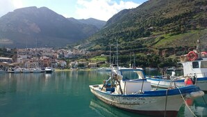 A harbor with boats docked, a town in the background, and mountains. - EXCLUSIVE PRIVATE SAPPHIRE HOME, SALT WATER POOL, NATURAL CHLORINE, NO CHEMICALS (Partinico)