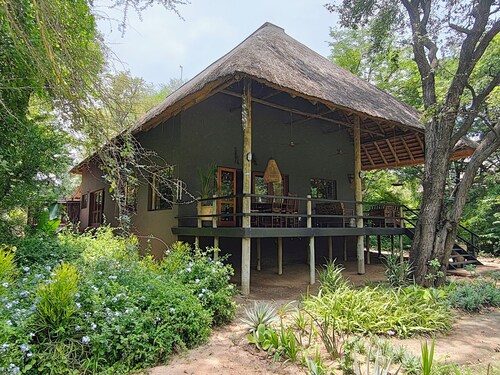 Luxury Villa 1 km from Kruger Park veranda overlooking the garden and ponds