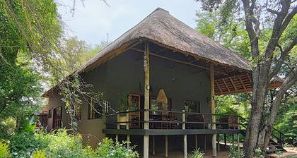 Luxury Villa 1 km from Kruger Park veranda overlooking the garden and ponds