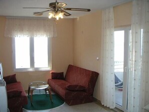 TV - Panoramic view apartment  in Rafailovici. 200 m from sandy beaches. (Budva)