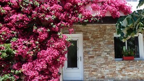 A building with a stone facade and a door. - If you like peace and quiet between sea and mountains (Zonza)