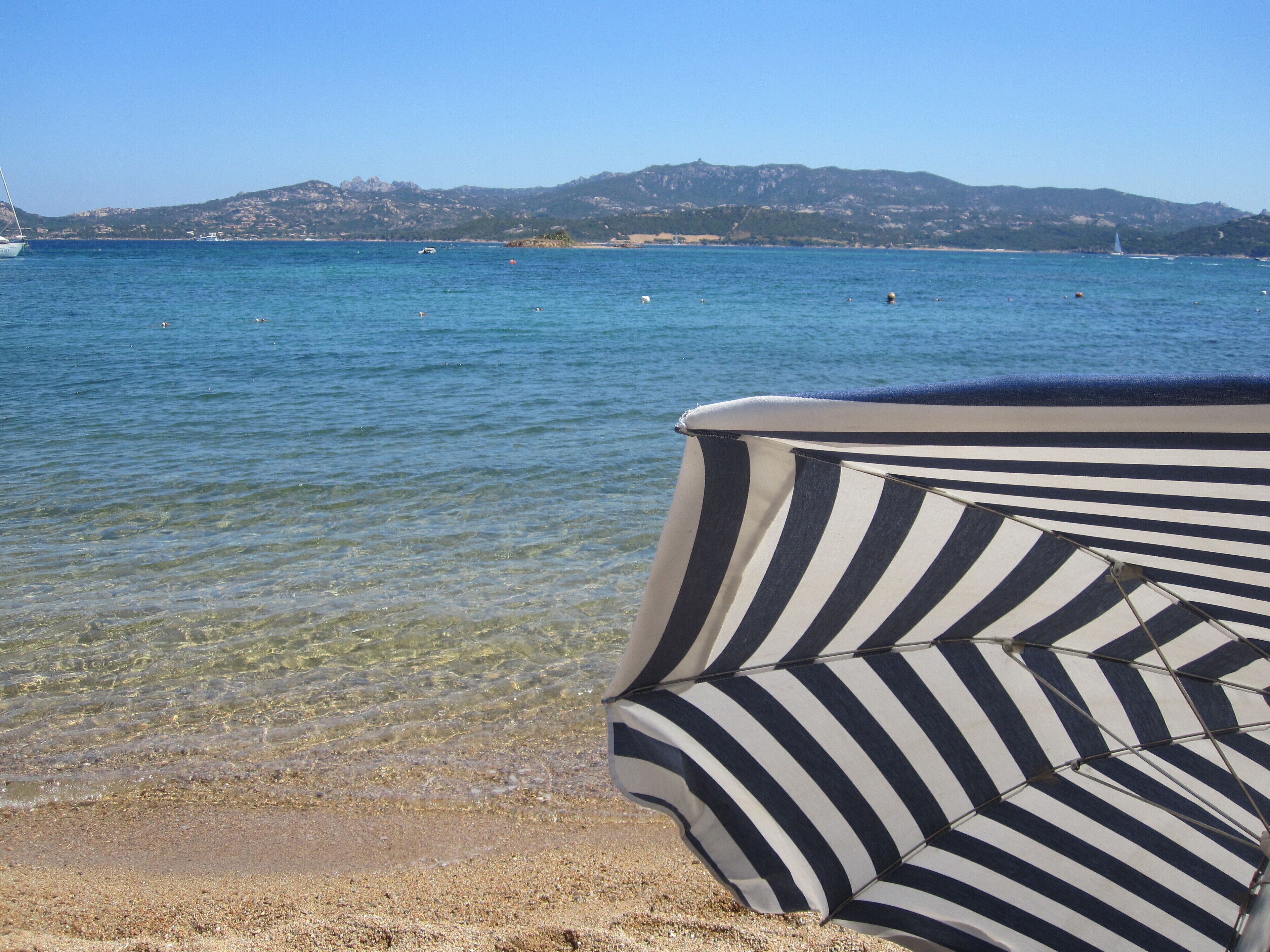 On the beach, sun loungers