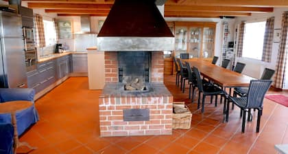 Dream house under thatch with fireplace, sauna, wellness room and lots of space