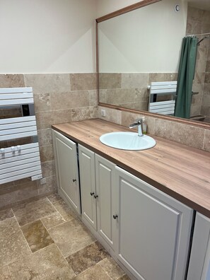 Shower, hair dryer, towels, soap
