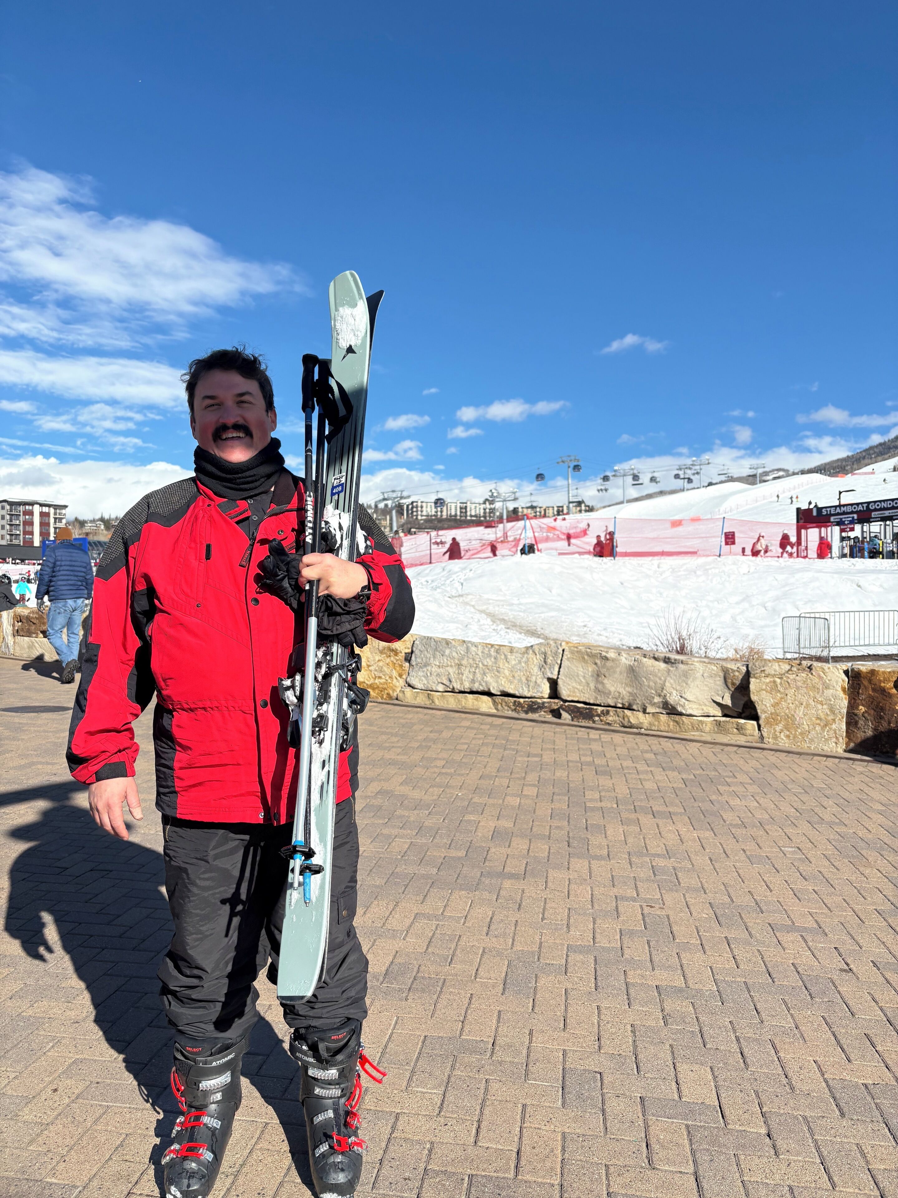 Happy skier! Fresh off a bluebird day on the slopes.