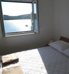 2 dormitorios, tabla de planchar con plancha, wifi gratis y ropa de cama