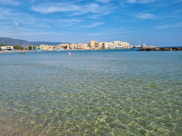 On the beach, sun-loungers