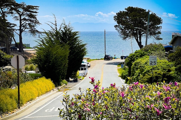 Gorgeous ocean view from deck, family room and dining room. Steps to the beach.