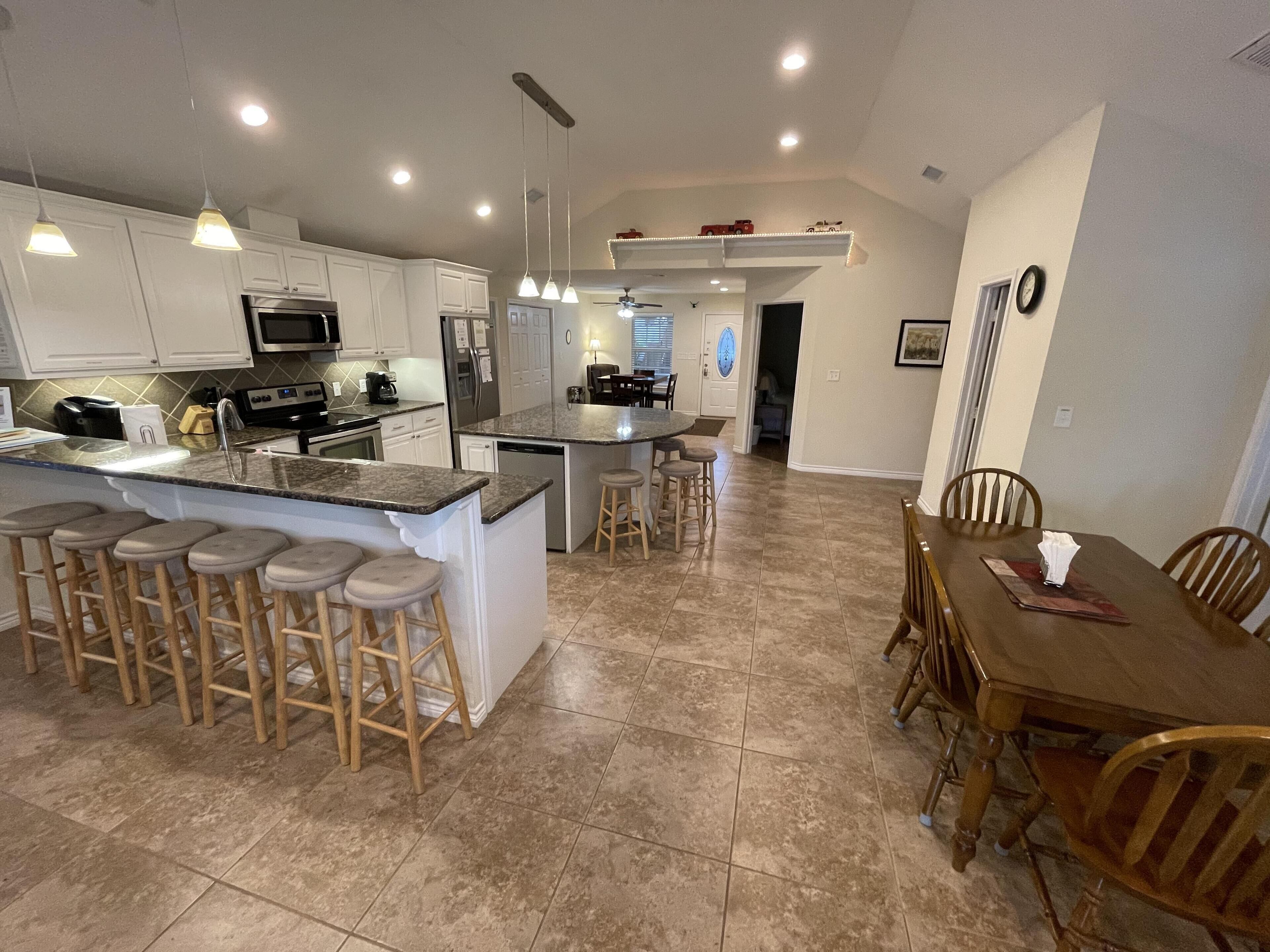 "Pat's Place" An incredible lakefront home with kayaks and decks galore.